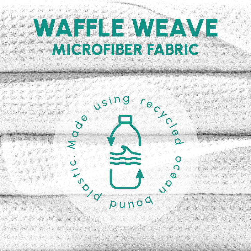 SUN'Y Stripes sand free towel waffle weave fabric and ocean-bound plastic badge